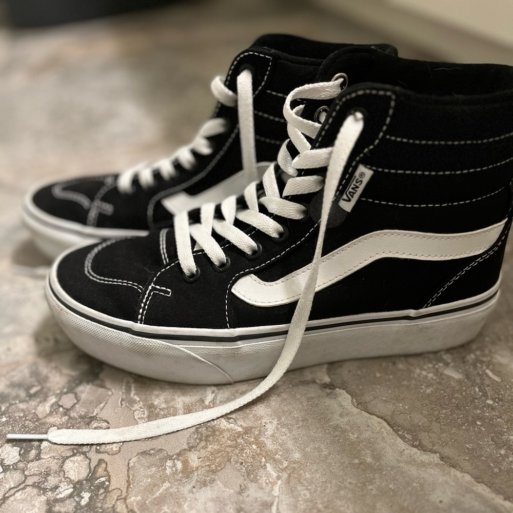 Vans high top sneakers with platform.